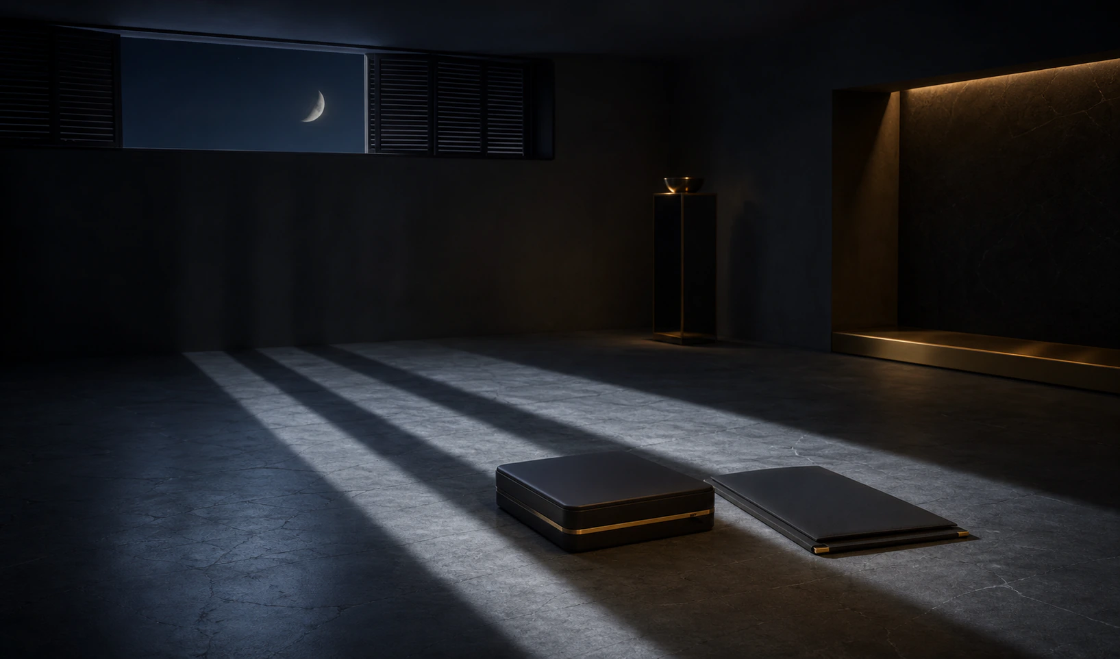 Increasing bands of moonlight reaching a ready product case and blank partnership folio in an empty studio